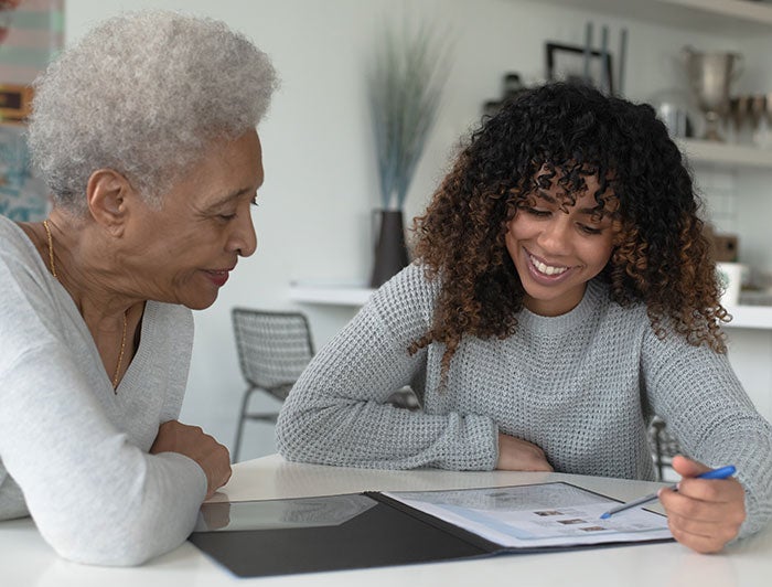 Older person looking at video call