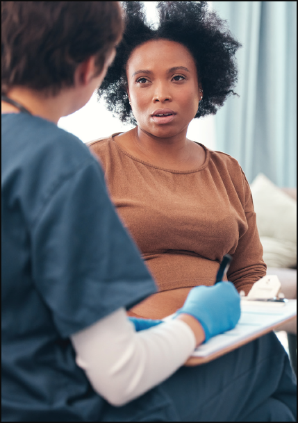 Medical staff asking pregnant female questions